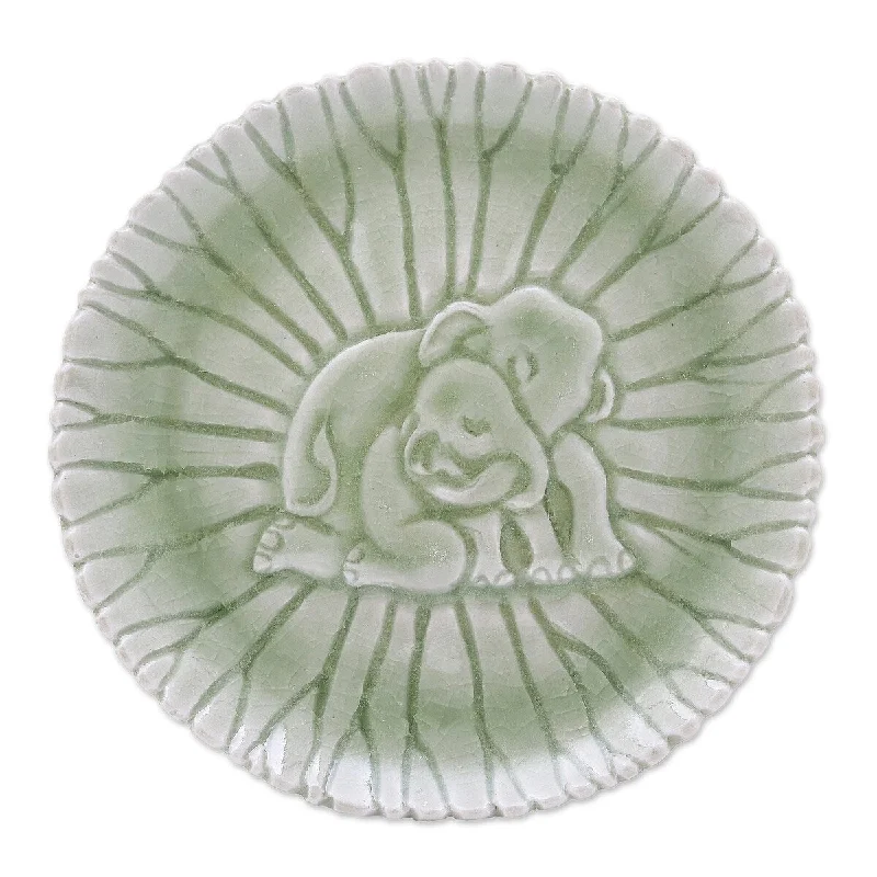 eco-friendly bamboo serving trays for family events -Novica Handmade Elephant Nurture Small Celadon Ceramic Plate