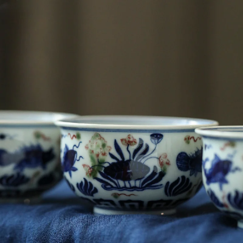 travel coffee mug with handle -Gohobi Hand-painted Wood-fired Red, Blue and White Fish Yongle Hand-pressed Tea Cup